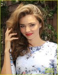 Miranda Kerr  gorgeous in a floral print dress headed to a meeting in New York City, June 30 2013
