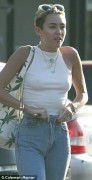 Miley Cyrus - Leaving a building in LA (7-4-2013)