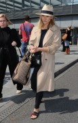 Elizabeth Olsen - arriving to Heathrow airport in London 4/20/2015